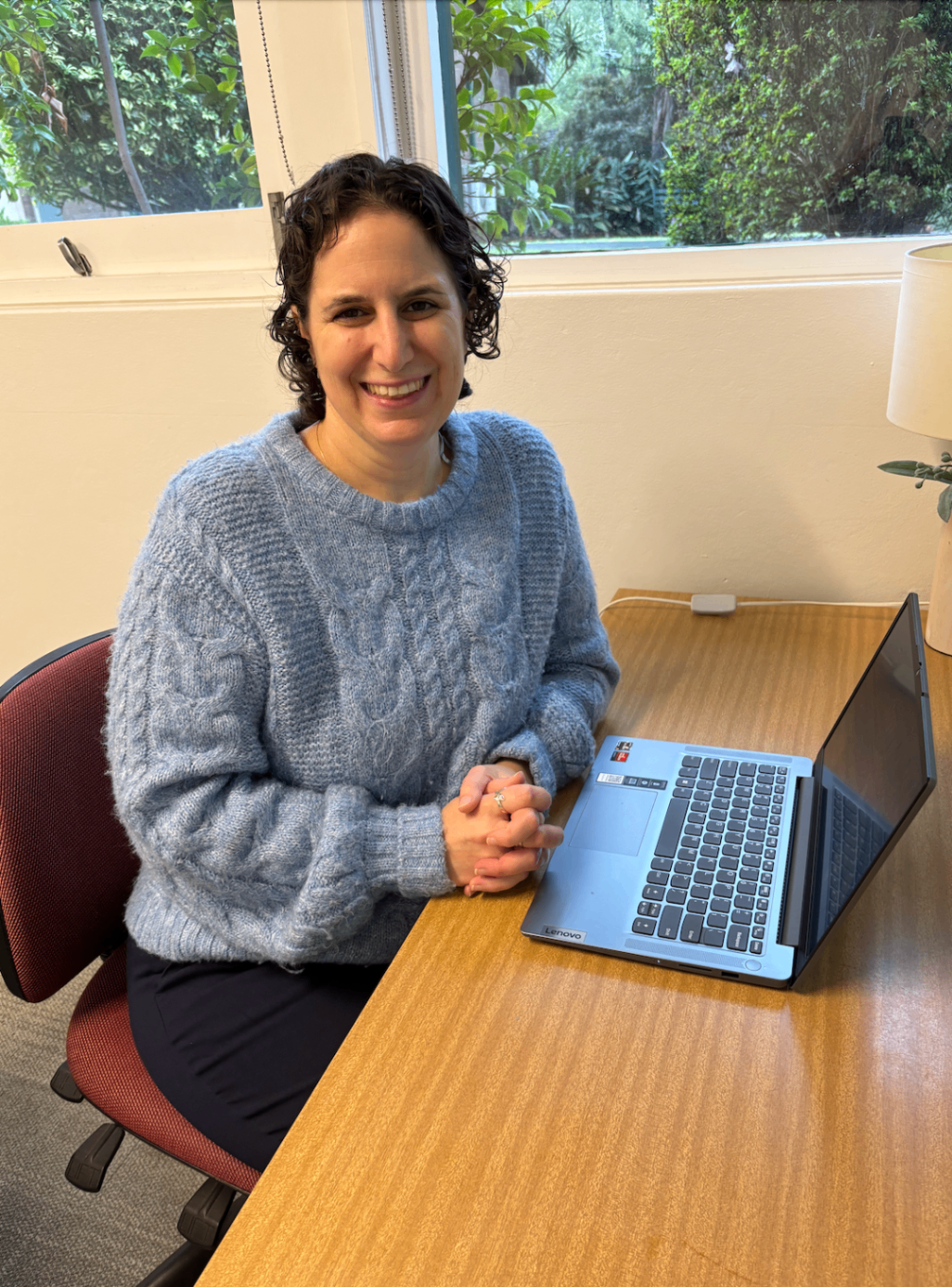 Portrait of the Ilanot Counselling practitioner at their desk